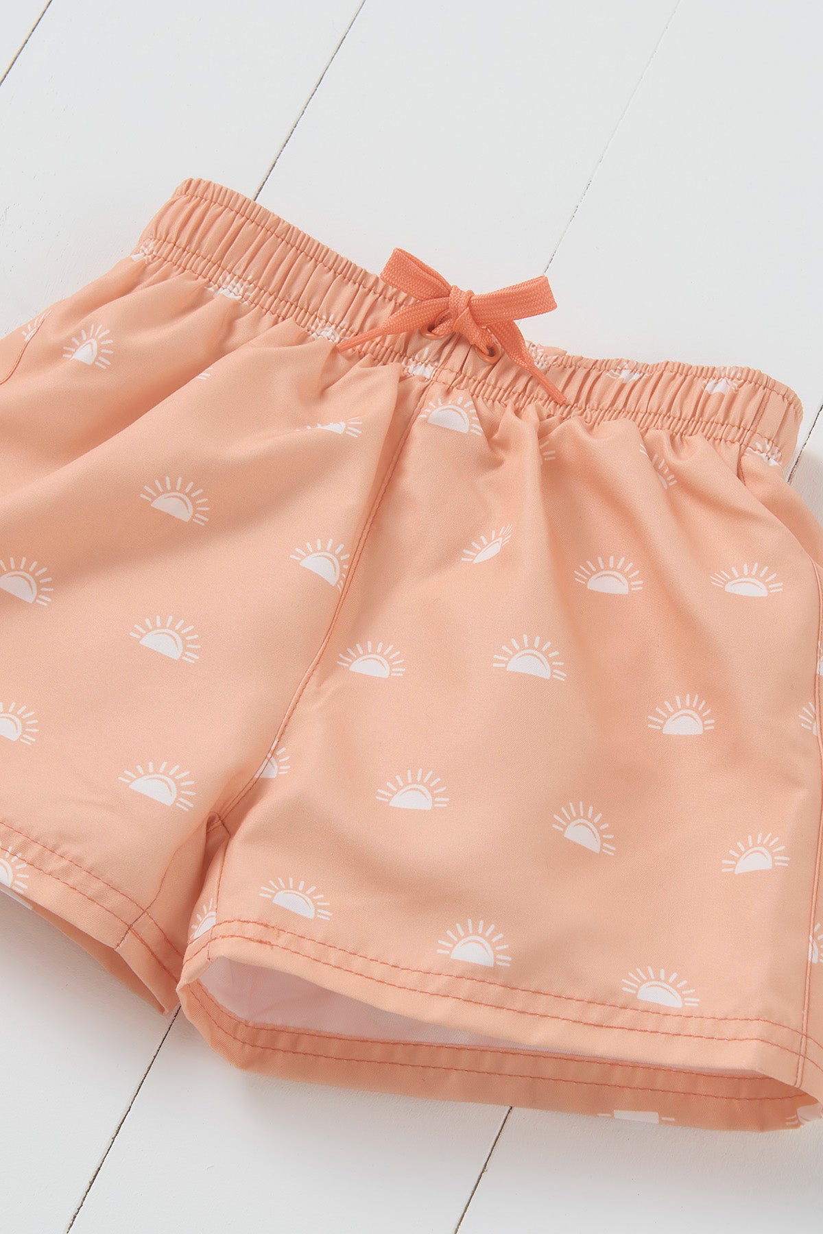 Grass and Air peach sun print kids swim shorts
